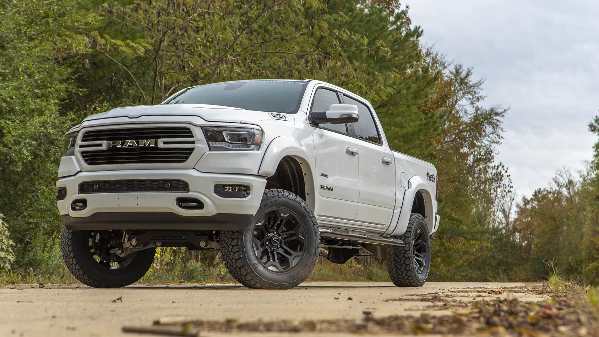 SCA RAM 1500 Apex Lifted Truck in White